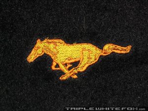 Yellow embroidered pony